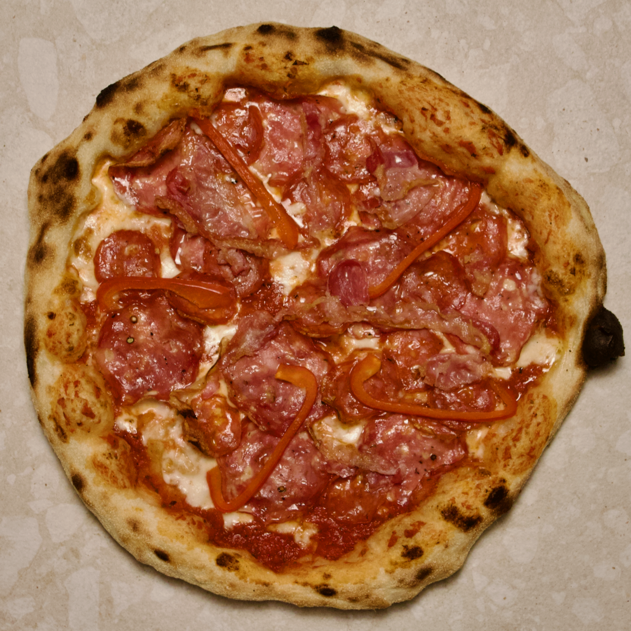 Contadino Pizza - salami, sausage, pancetta, red pepper